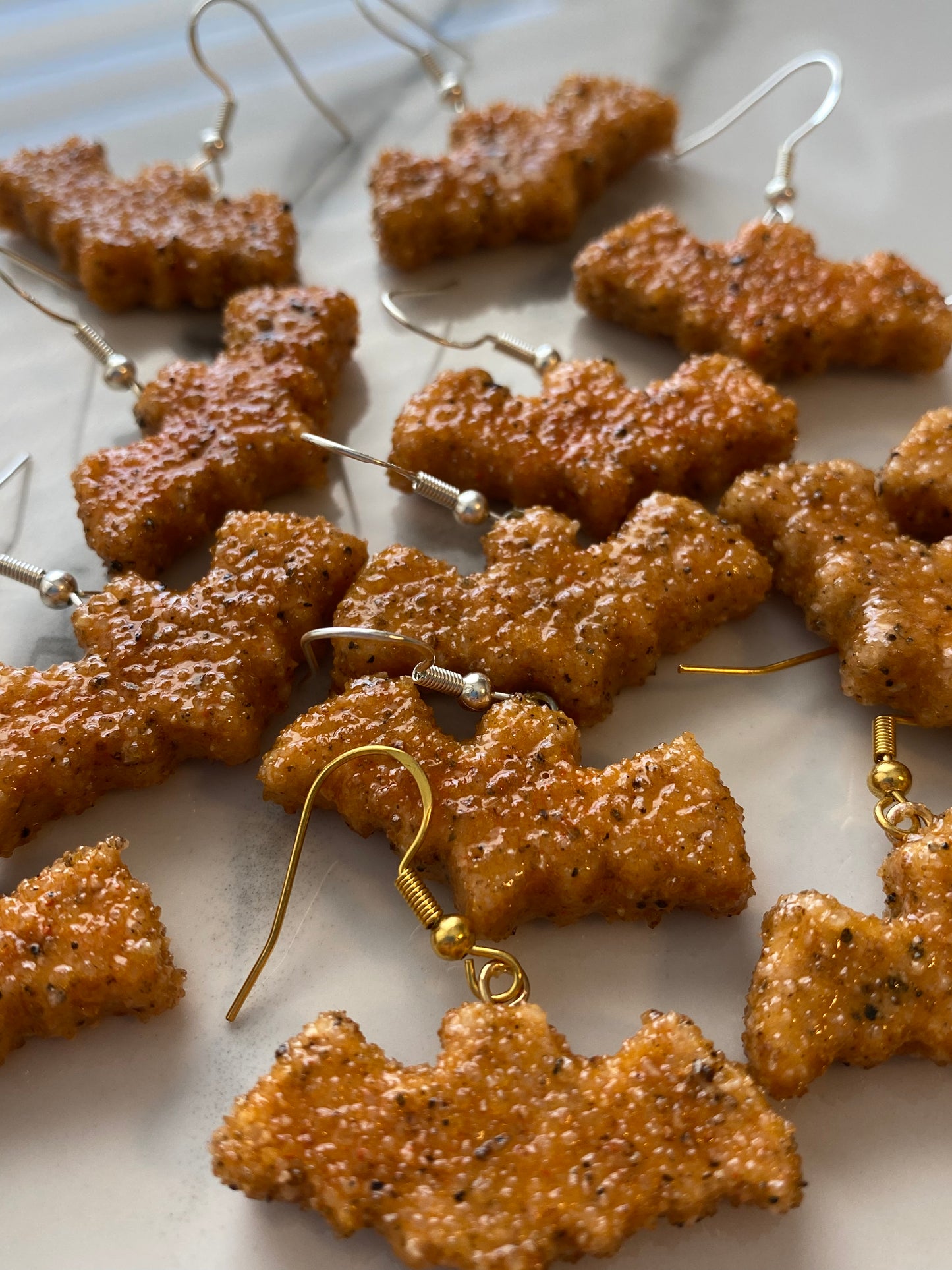 Bat chicken nugget earrings